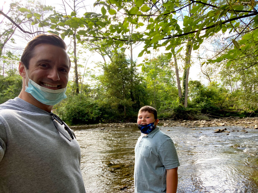Volunteer and friend at the creek